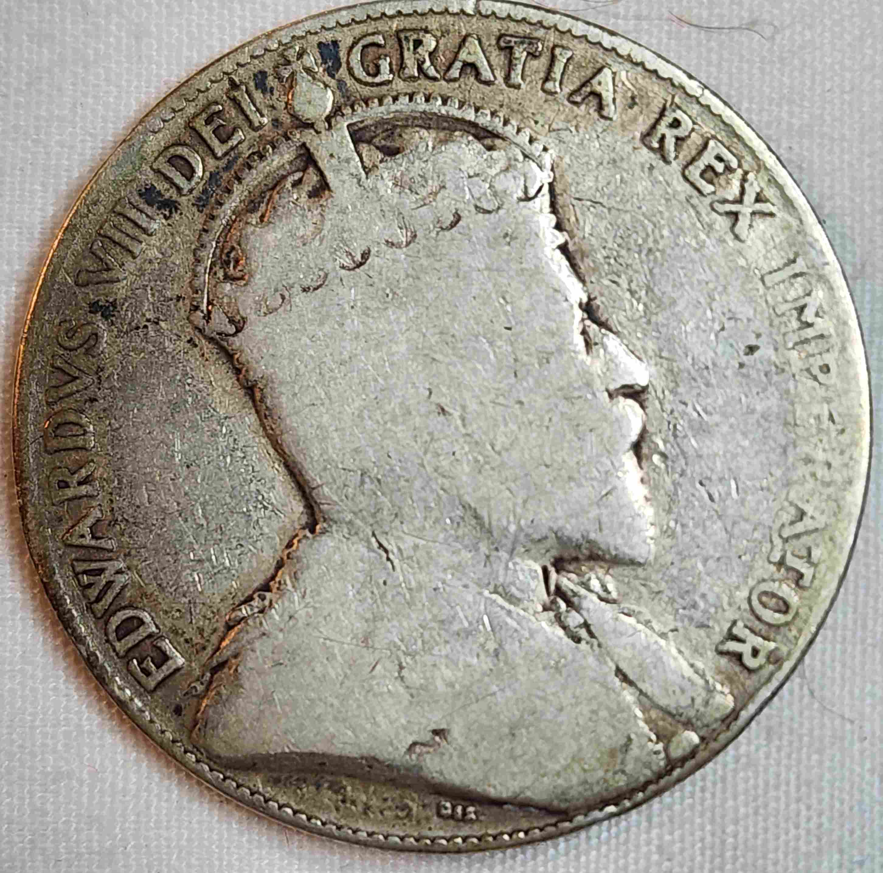 Anyway-To-Tell-Which-Leaves-These-2-Ag-1910-50-Cent-Pieces-Are?